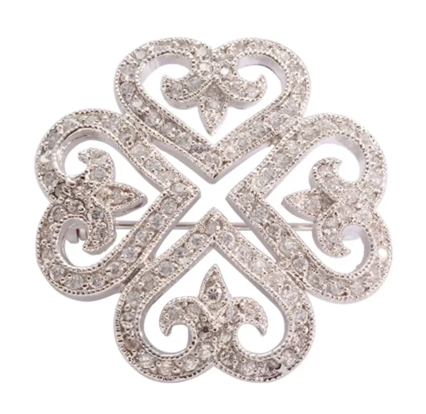 Rhodium Finish Clover Pin with White Cubic Zirconia.
