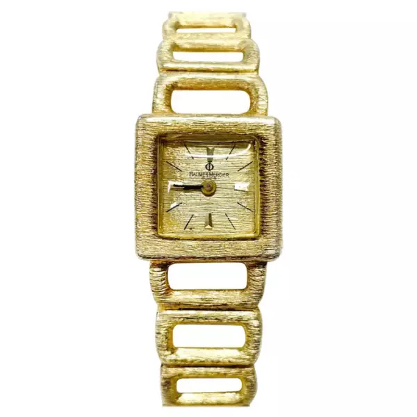 Наручные часы Baume et Mercier из желтого золота.