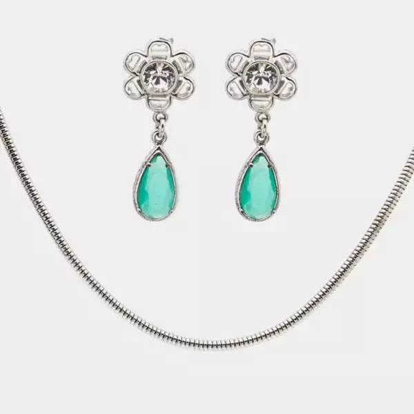 Ожерелье и серьги Aigner с кристаллами серебристого цвета.