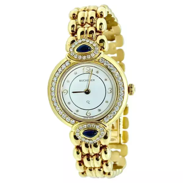 Великолепные женские часы Bucherer Paradiso 28 мм. Это изделие выполнено из 18 каратного желтого золота и украшено 47 бриллиантами и двумя сапфирами треугольной формы огранки кабошон. Великолепные женские часы Bucherer Paradiso 28 мм. Это изделие выполнено из 18 каратного желтого золота и украшено 47 бриллиантами и двумя сапфирами треугольной формы огранки кабошон.