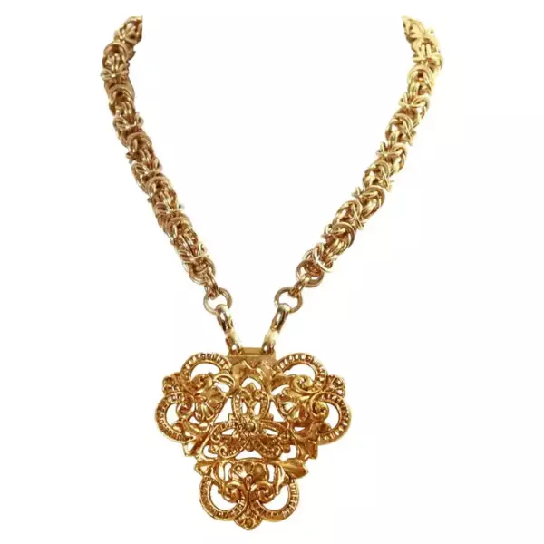 Винтажное длинное колье золотистого цвета с гербом Anne Klein, около 1980 х годов.