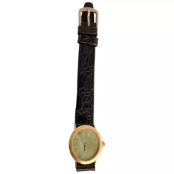 Женские наручные часы Baume & Mercier из желтого золота с ручным управлением.