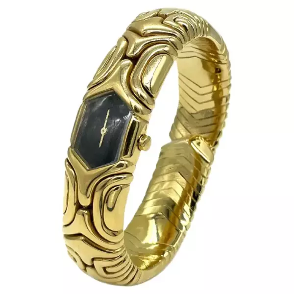 Золотые часы Bulgari Alveare с черным циферблатом.
