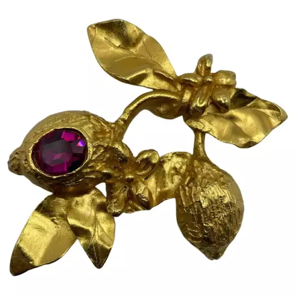 Винтажная золотистая брошь Christian Lacroix.