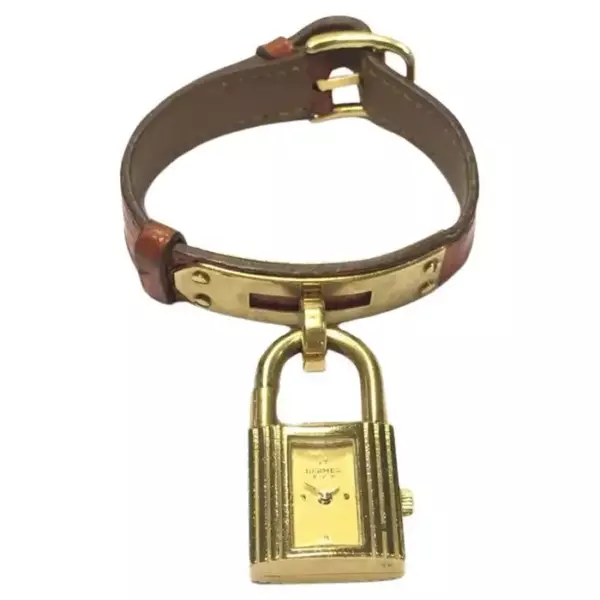Винтажные часы Hermès Kelly PM с браслетом из кожи крокодила. Винтажные часы Hermès Kelly PM с браслетом из кожи крокодила.