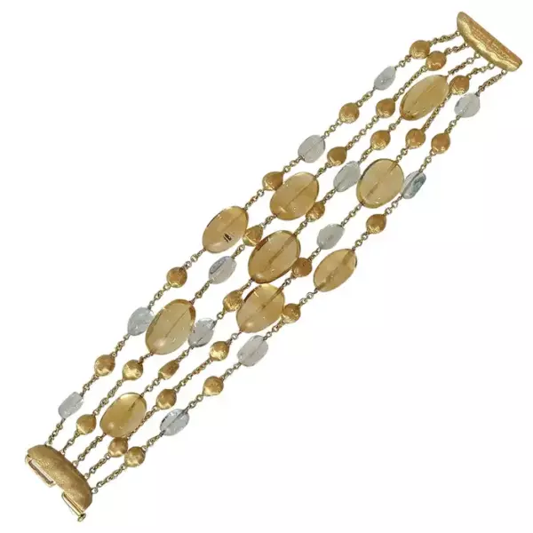 Браслет Marco Bicego Signature Gold Nugget из нескольких нитей с камнями. Браслет Marco Bicego Signature Gold Nugget из нескольких нитей с камнями.