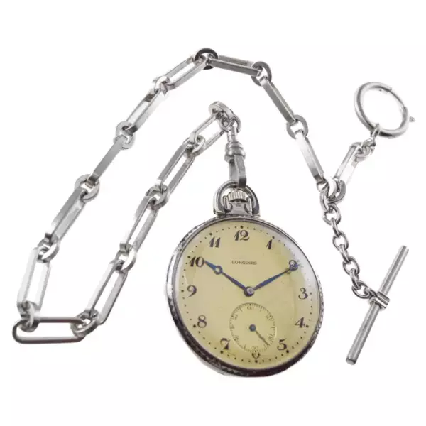 Часы Longines Silver & Niello с циферблатом 1915 года и соответствующей цепочкой Stern Freres. Часы Longines Silver & Niello с циферблатом 1915 года и соответствующей цепочкой Stern Freres.