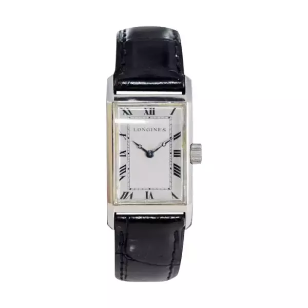 Часы Longines Tank в стиле ар деко с уникальным стальным корпусом ручной работы 1928 года. Часы Longines Tank в стиле ар деко с уникальным стальным корпусом ручной работы 1928 года.