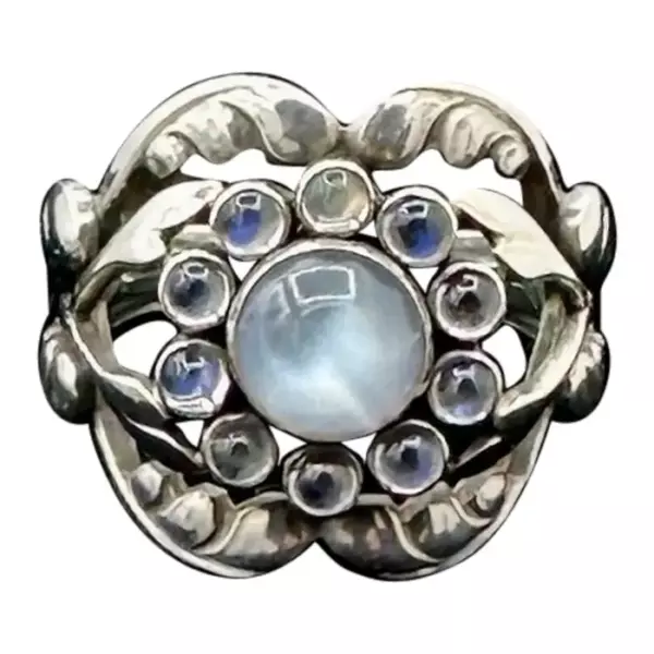 Кольцо Georg Jensen Moonlight Blossom с лунным камнем 10 пробы, Дания, серебро. Кольцо Georg Jensen Moonlight Blossom с лунным камнем 10 пробы, Дания, серебро.