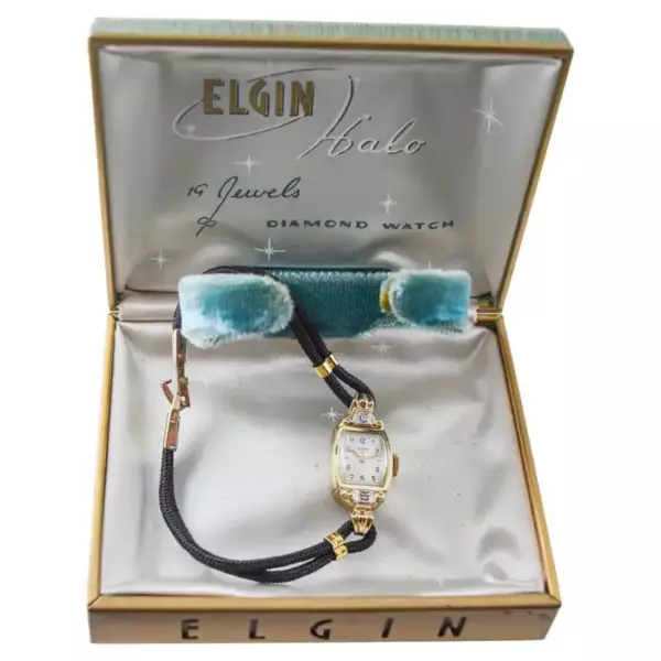 Женские часы Elgin в стиле ар деко из цельного золота со шнурком, 1940 е годы, в коробке.