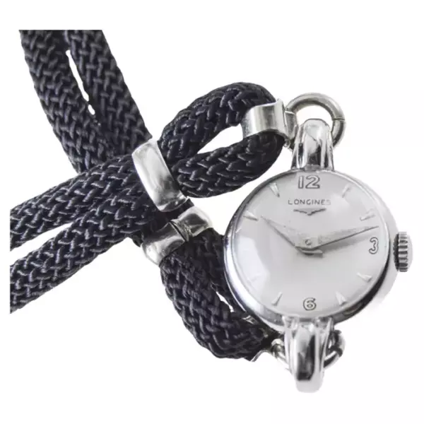 Женские часы Longines из нержавеющей стали в стиле ар деко со шнурком, 1940 е годы. Женские часы Longines из нержавеющей стали в стиле ар деко со шнурком, 1940 е годы.