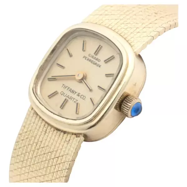 Женские наручные часы Tiffan Girard Perregaux из 14 каратного золота.