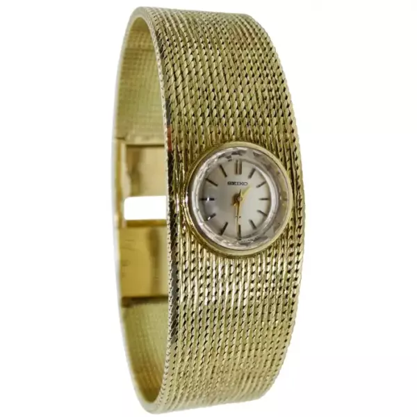 Наручные часы Seiko из 14 каратного золота.