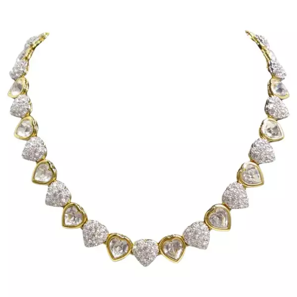 Swarovski Vintage 14K Gold Plated Crystal Heart Choker — это гламурное и привлекающее внимание украшение 1980 х годов. Swarovski Vintage 14K Gold Plated Crystal Heart Choker — это гламурное и привлекающее внимание украшение 1980 х годов.