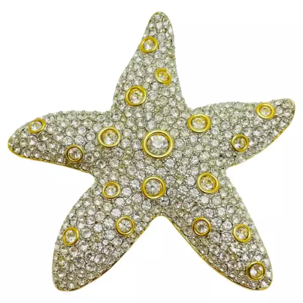 Винтажная брошь SWAROVSKI SAL с позолоченными кристаллами в виде морской звезды. Винтажная брошь SWAROVSKI SAL с позолоченными кристаллами в виде морской звезды.