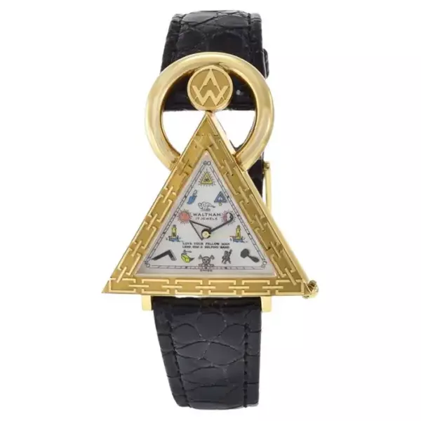 Часы Waltham Masonic из 18 каратного желтого золота с перламутровым циферблатом.