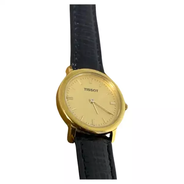 Женские часы Tissot с позолоченным корпусом из нержавеющей стали цвета шампанского, швейцарским кварцевым механизмом, корпус 23 мм.