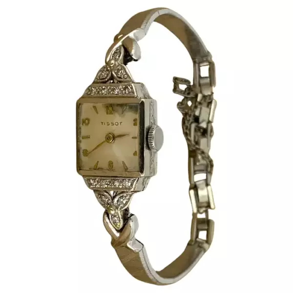 Женские наручные часы Tissot Retro 1960 х годов с ручным заводом из 18 каратного белого золота, платины и бриллиантов.